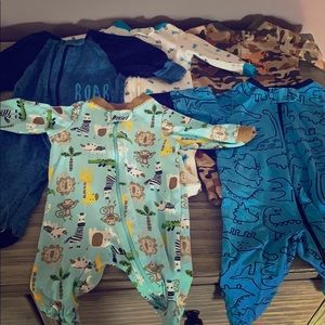 5 Newborn Footed Onsies.